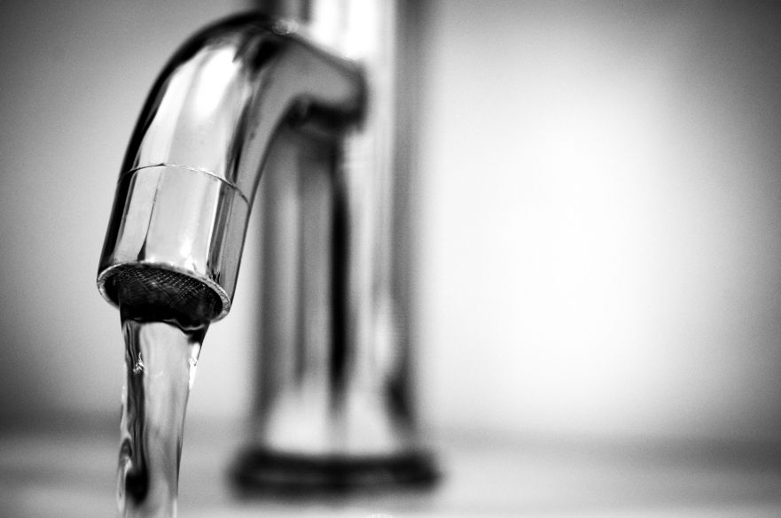 Running water coming out of a faucet