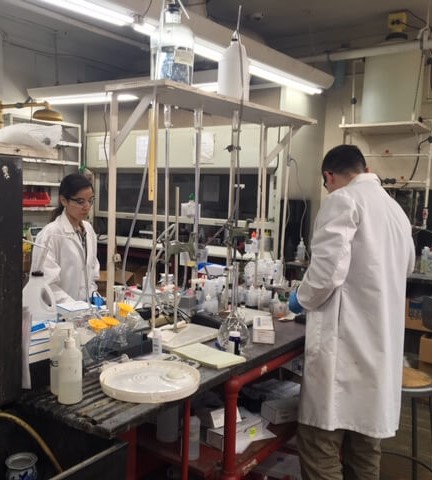 technicians testing drinking water for contaminants