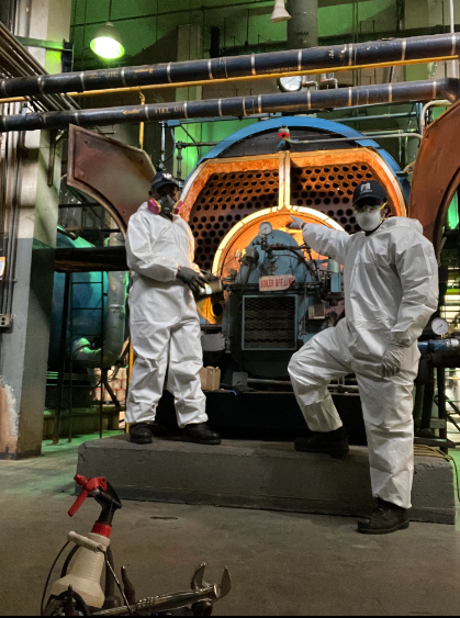 boiler cleaning crew from Metro Group, performing summer maintenance to ensure optimal boiler performance